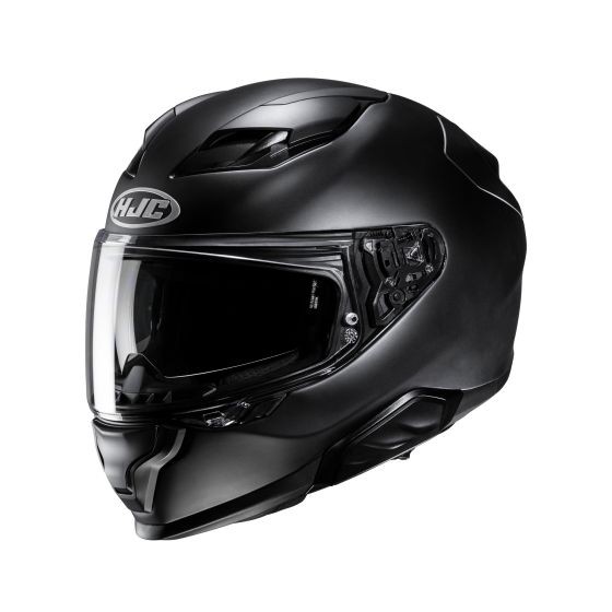 Matt black HJC F71 full face helmet featuring a sleek aerodynamic design, a clear visor, and ventilation ports for enhanced airflow.