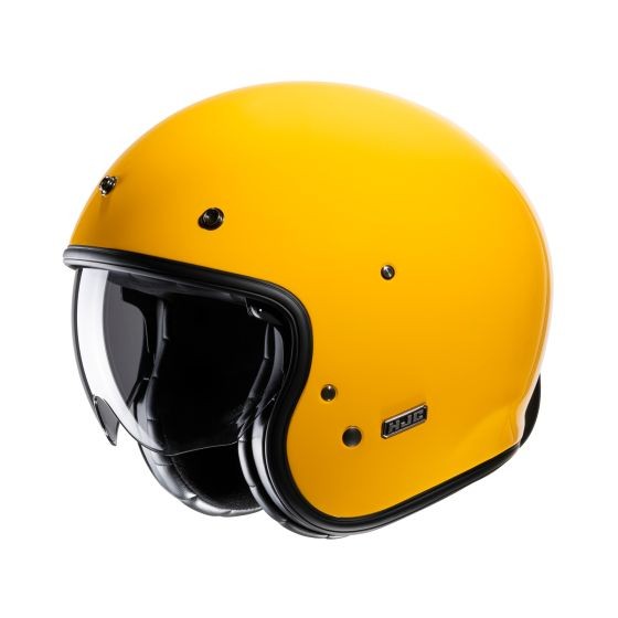 Bright yellow open face helmet with a glossy finish, featuring a clear visor, black trim, and ventilation holes, designed for comfort and style by HJC.