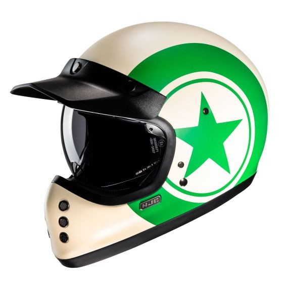 Green and cream full face motorcycle helmet featuring a prominent green star design, a black visor, and ventilation ports.