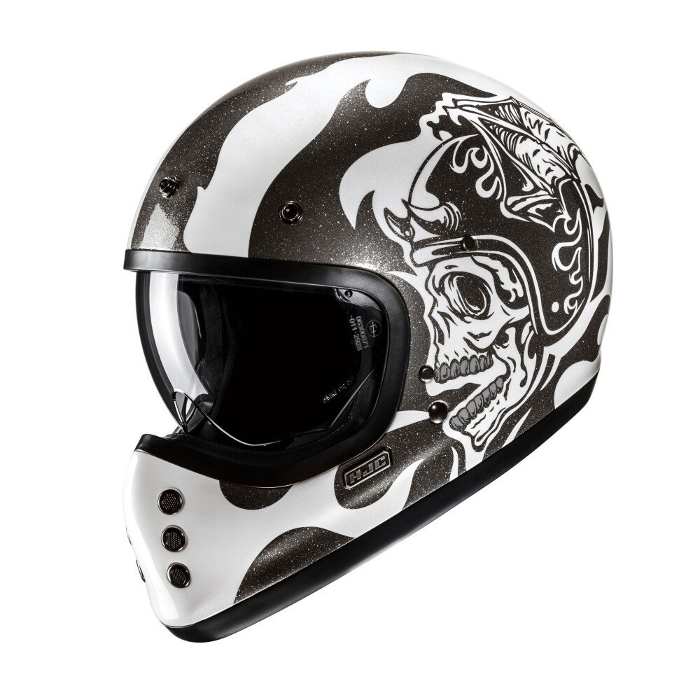 Black and white full-face motorcycle helmet featuring a flame design, skull graphic on the side, glossy finish, and a tinted visor.