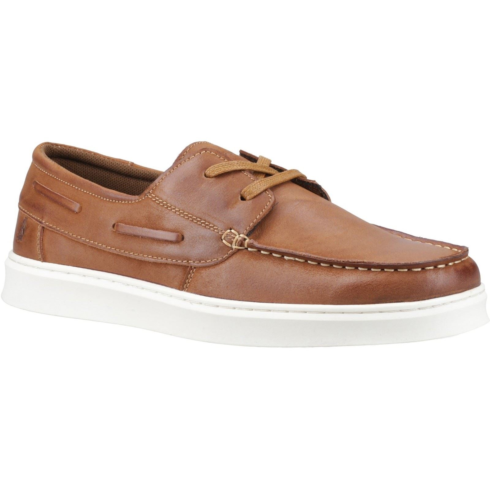 Tan leather boat shoes featuring a classic design, lace-up front, and contrasting white rubber sole, ideal for casual wear.