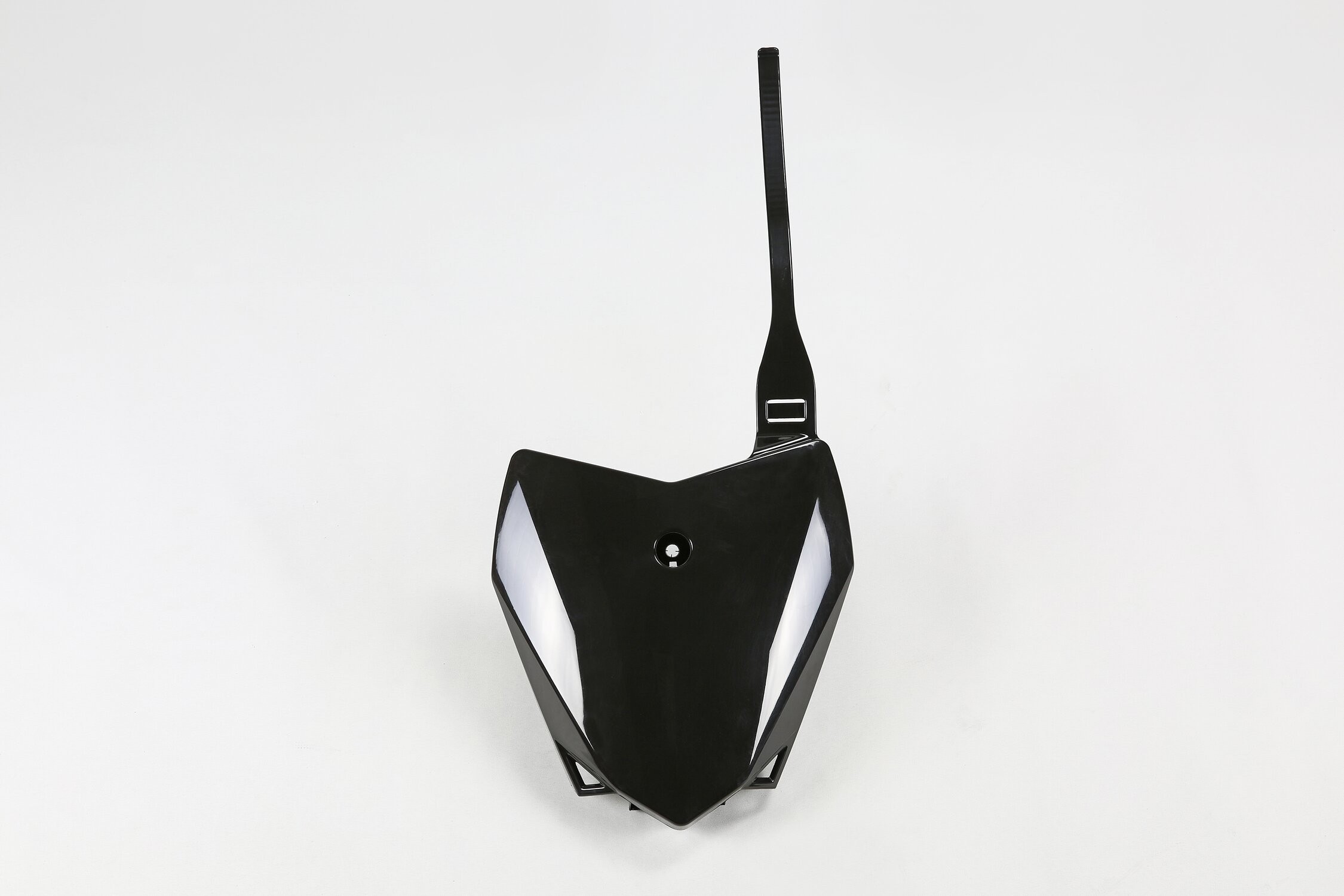 Black UFO front number board for Kawasaki KLX110 (2010-2018) featuring a sleek, angular design with a glossy finish and a mounting tab at the top.