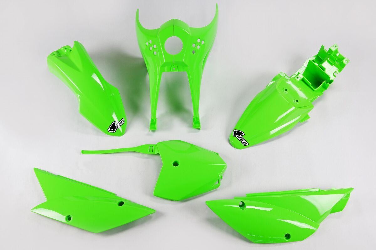 Bright green full plastics kit for Kawasaki KLX110 (2010-2016) featuring multiple body panels, including front fender, side panels, and rear sections, made of durable plastic.