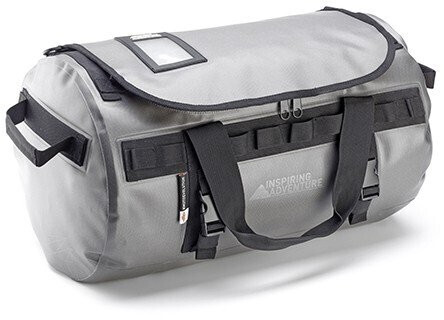 Water-resistant silver motorcycle tail bag with black straps, a clear ID window, and multiple exterior pockets, featuring the "Inspiring Adventure" logo prominently displayed.