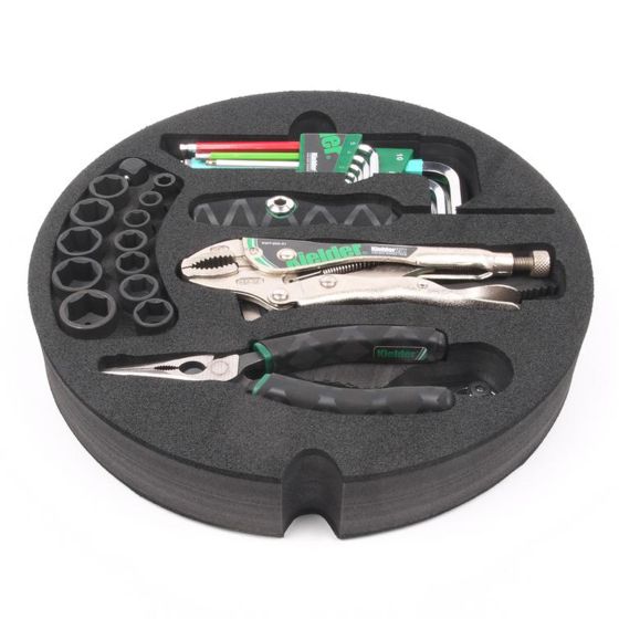 Kielder Layer Cake Hand Tool Kit in a round black foam case, featuring silver pliers, a variety of hex keys, and multiple socket sizes, all neatly organized.