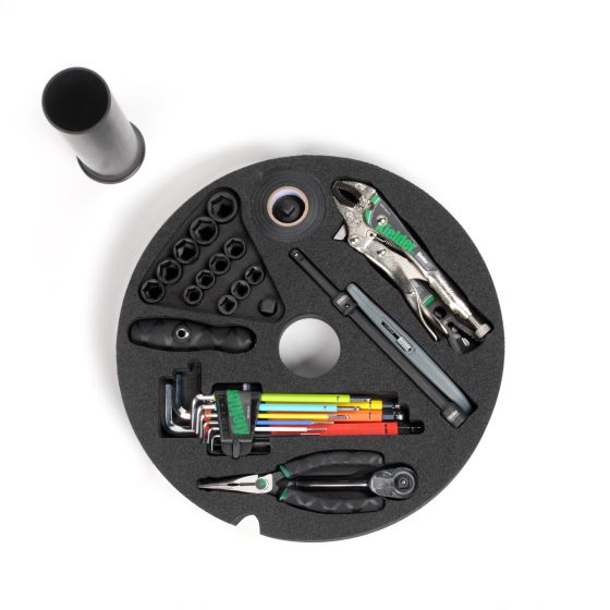 Kielder Layer Cake Hand Tool Kit features a black foam insert with various tools, including pliers, wrenches, a marker, and sockets, all organized in a circular layout.