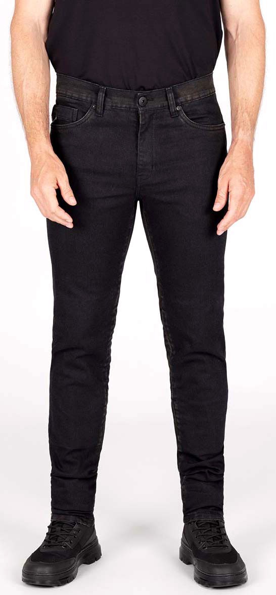 Black Knox Colton jeans in Short XL size, featuring a slim fit design, subtle stitching details, and a classic five-pocket style, paired with black boots.
