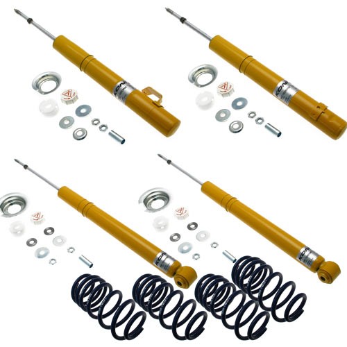 KONI 1140-4871 suspension kit featuring yellow coil springs and shock absorbers, with various metal washers and components for front axle installation.
