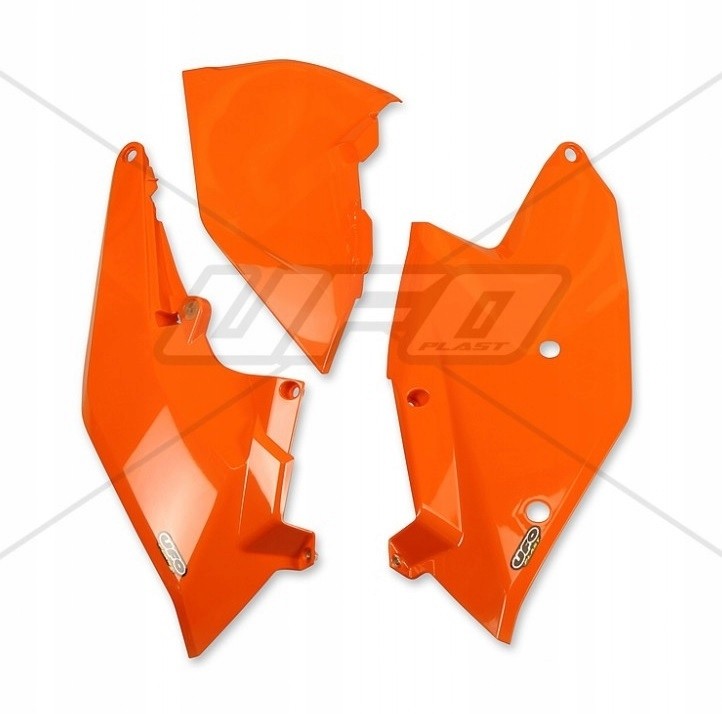 Bright KTM orange side panels made of durable plastic, designed for the KTM EXC250 2017 model, featuring a sleek, aerodynamic shape and precise cutouts for easy installation.