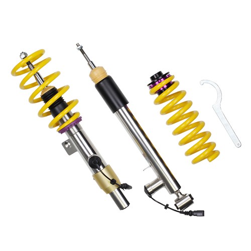 KW Suspension DDC-ECU Coilover Kit featuring yellow springs, stainless steel shock bodies, adjustable dampers, and a tuning wrench, designed to lower vehicle height for improved performance.