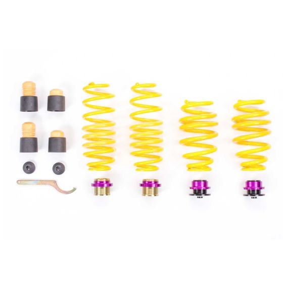 KW Suspension Height-Adjustable Lowering Spring Kit featuring vibrant yellow coil springs, purple adjustment knobs, and various mounting components for front and rear lowering.