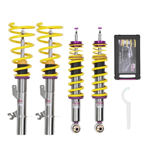 KW Gewindefahrwerk V3 Variante 3 Inox for BMW 4 Series, featuring stainless steel construction, yellow springs, purple accents, and adjustment tools in a black carrying case.