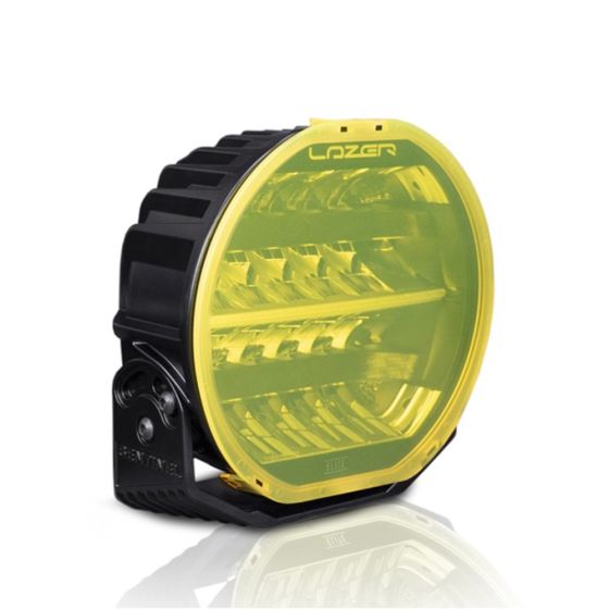 Round amber light cover with a black plastic housing, featuring a textured lens and a sturdy mounting bracket, designed for Lazer Lamps Sentinel lights.