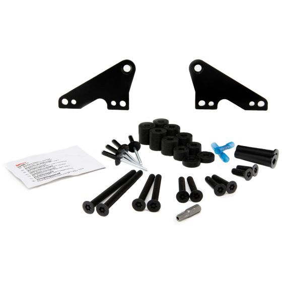 Black metal mounting brackets and various screws, bolts, and rubber spacers for the Lazer Lamps Universal Light Bar Roof Mounting Kit, accompanied by an instruction sheet.