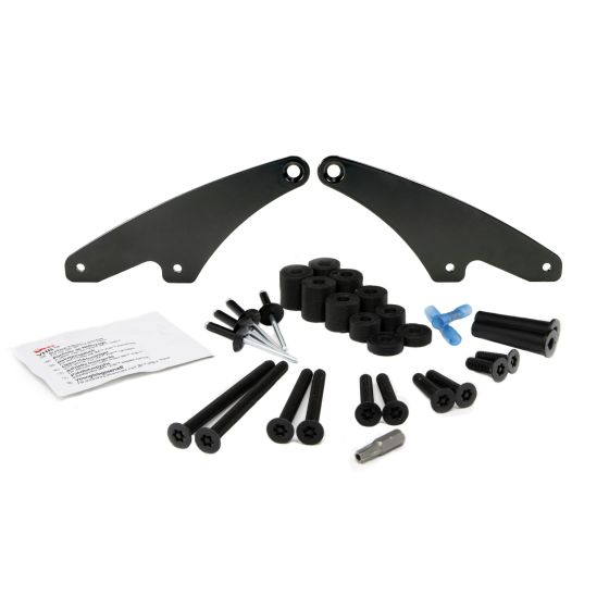 Lazer Lamps Universal Light Bar Roof Mounting Kit includes two black metal brackets, multiple black screws, rubber spacers, and installation instructions, designed for roof rail mounting.