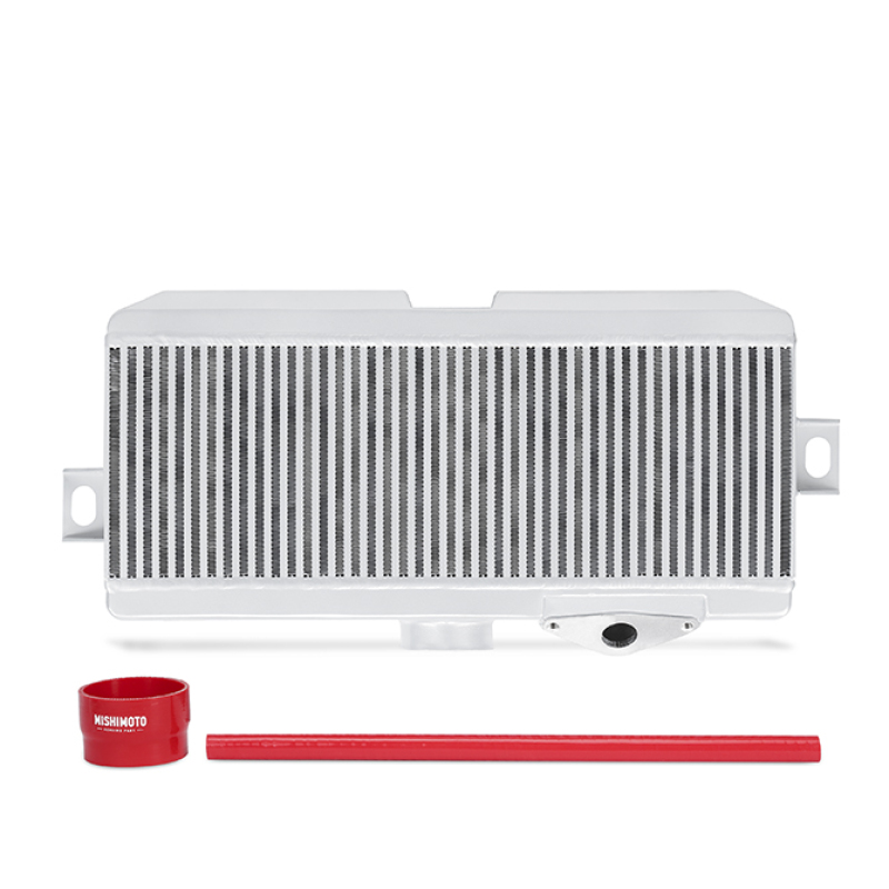 Silver top-mount intercooler with a ribbed surface, featuring a red silicone hose and a Mishimoto logo, designed for Subaru STI models from 2008 to 2021.