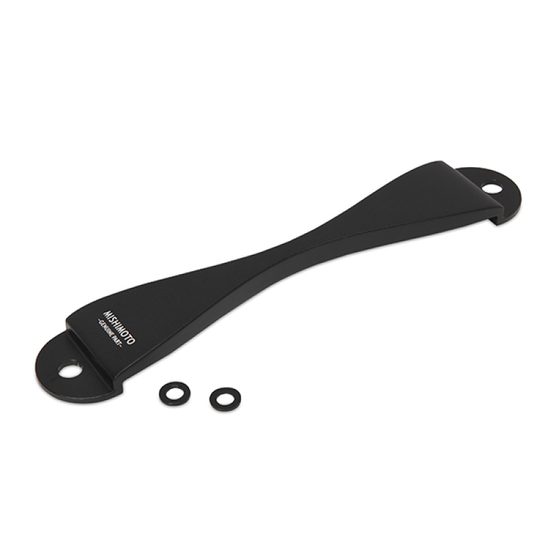 Black CNC battery tie down with a sleek, curved design, featuring two holes for mounting and two rubber washers included, compatible with Subaru vehicles.
