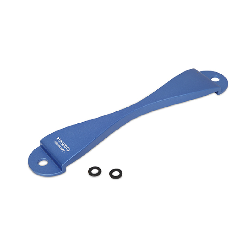 Blue aluminum battery hold down with a sleek, curved design, featuring two mounting holes and accompanied by two black rubber washers, marked with the Mishimoto logo.