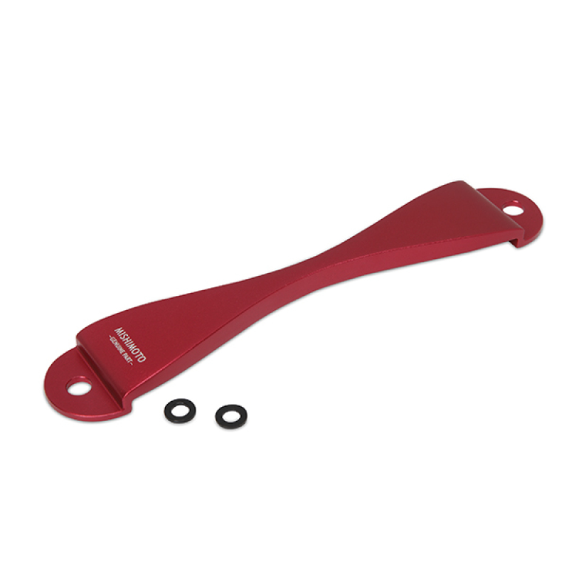 Red CNC battery tie-down with a sleek, curved design, featuring two mounting holes and accompanied by two black rubber washers, compatible with Subaru vehicles.
