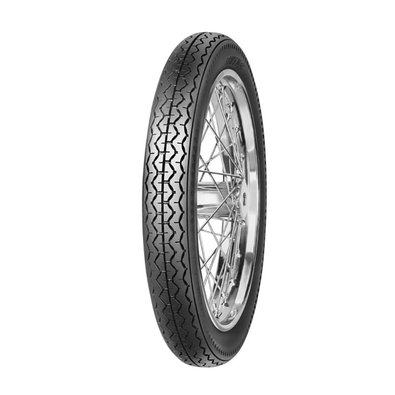 Black motorcycle tire with a tread pattern designed for grip, mounted on a shiny silver wire-spoke rim, labeled "Mitas H01 2.75-19 TT 43P."