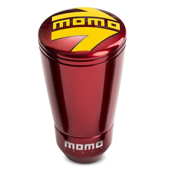 Red aluminum gear knob with a glossy finish, featuring a prominent yellow "MOMO" logo and a sleek tapered design for enhanced grip.