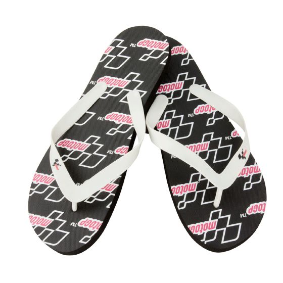 Black flip flops with a Moto GP logo and white racing stripes, featuring a comfortable rubber sole and white thong straps, sized 45-46.