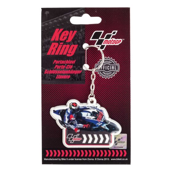 PVC keyfob featuring a blue and black motorcycle design, showcasing the Moto GP logo, attached to a silver keychain, with a card backing displaying branding details.
