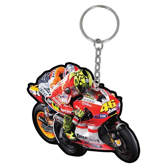Red PVC keyfob featuring a detailed design of Valentino Rossi racing on a Ducati motorcycle, complete with the number 46 and a metal keyring attachment.