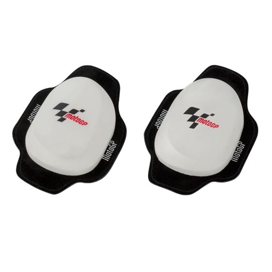 White Moto GP knee sliders with a black rubber backing, featuring the Moto GP logo and checkered flag design, designed for motorcycle track days.