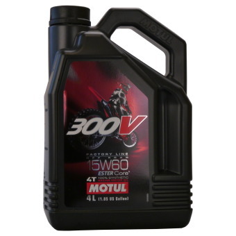 Black plastic container of MOTUL 104138 Engine Oil, 15W-60, with a capacity of 4 liters, featuring a red and silver label and a handle for easy pouring.