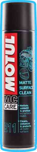 Black spray can with a red and white "MOTUL" logo, labeled "MC Care E11 Matte Surface Clean," designed for cleaning matte surfaces, featuring a sleek, modern design.
