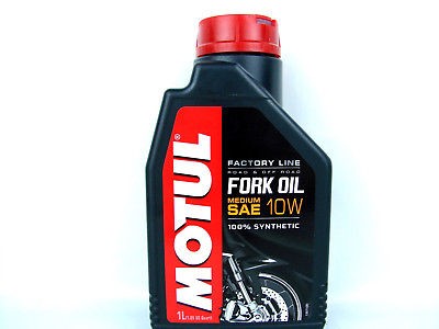 Black and red plastic bottle of MOTUL Factory Line Medium 10W Fork Oil, featuring a motorcycle graphic, 1-liter capacity, and labeled as 100% synthetic.