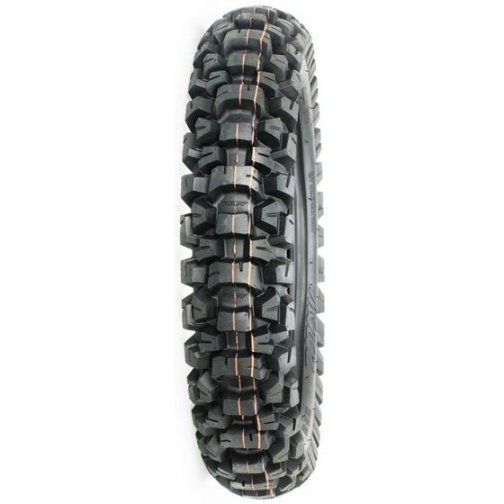 Black rubber motorcycle rear tyre with deep, aggressive tread patterns, featuring orange markings and labeled "MR035 - MotoZ Tractionator Desert 70Q 150/70B18."