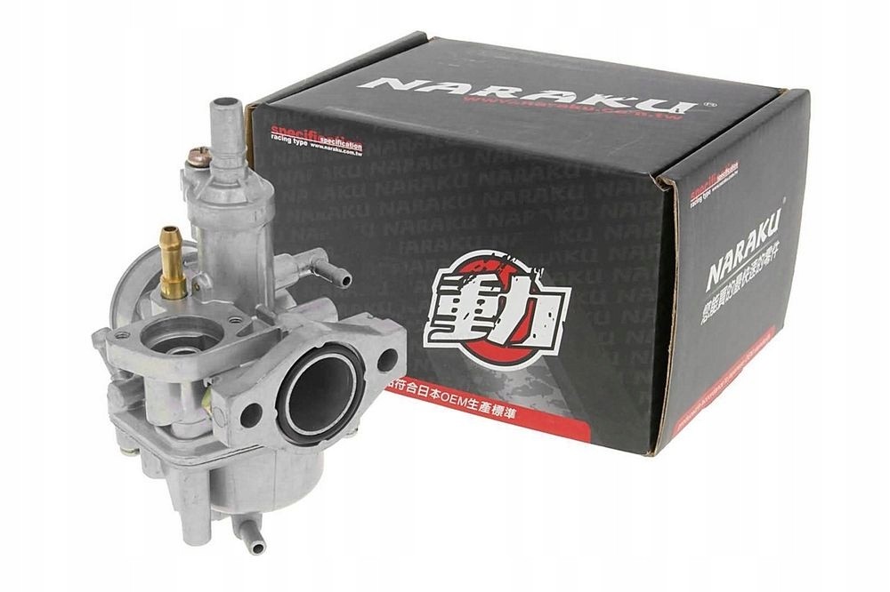 Silver carburetor with a black and red box labeled "Naraku," featuring a brass fuel inlet and a circular air intake, designed for Suzuki Katana and Zillion Sym models.