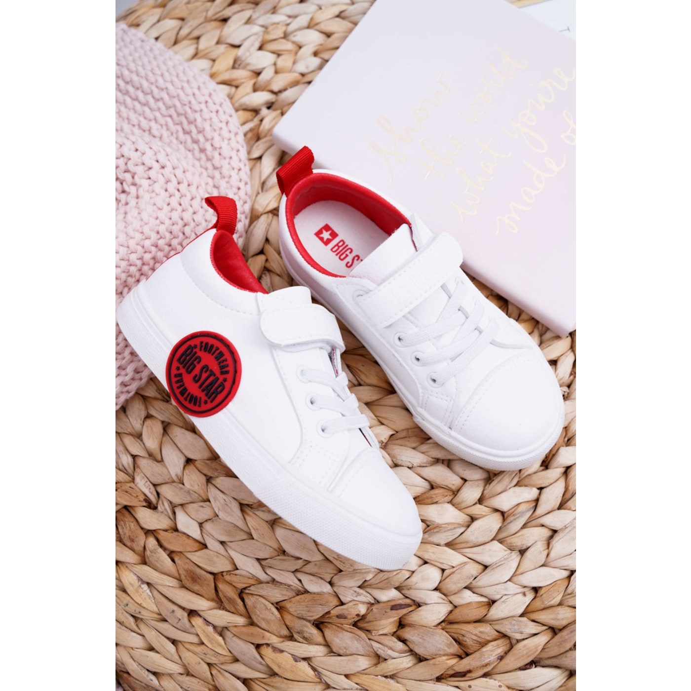 White NOCO Motorcycle Lithium Battery NLP14 with a sleek design, featuring a compact size, red and black branding, and a durable casing suitable for motorcycles.