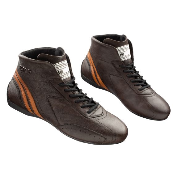 Dark brown leather OMP Carrera race boots, UK size 8 / EUR 42, featuring orange stripes, a high-top design, and a lace-up front for secure fit.