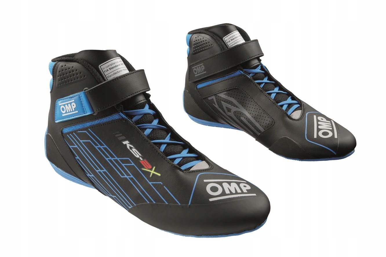 Black and blue karting shoes with a sleek design, featuring a synthetic material, lace-up front, Velcro strap, and prominent OMP branding. Size 42.