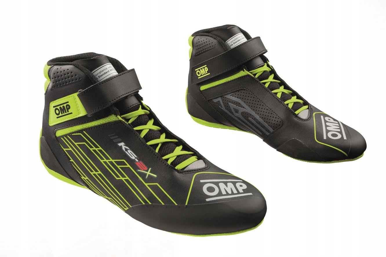 Black and yellow karting shoes with a sleek design, featuring a high-top silhouette, lace-up closure, and a Velcro strap for secure fit, marked with OMP branding.