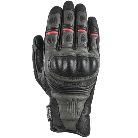 Short motorcycle gloves in tech green and black, featuring padded knuckles, red accents, and a combination of leather and textile materials for enhanced grip and protection.