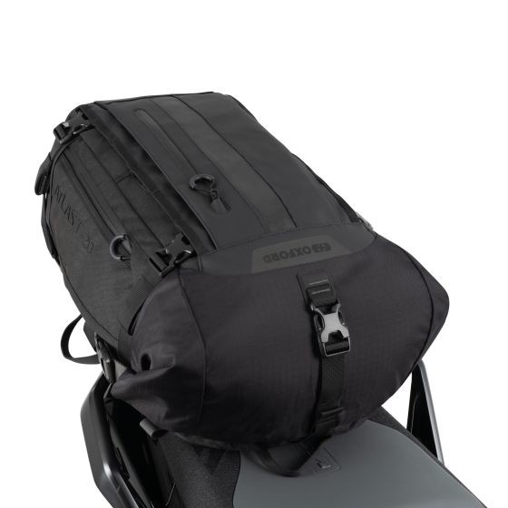 Black Oxford OL00101 Tail Bag features a durable, weather-resistant material with adjustable straps and a secure buckle closure, designed for motorcycle use.