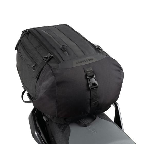 Black Oxford OL00201 Tail Bag featuring a durable fabric, adjustable straps, and a spacious design, ideal for motorcycle storage.