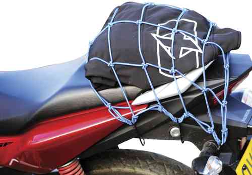 Blue Oxford Travel cargo net, measuring 30x30 cm, securely holds a black item on a motorcycle seat with elastic straps and a grid design for added stability.