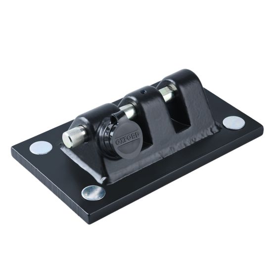 Black metal disc lock with alarm features a cylindrical keyhole and a sturdy base with four circular pads for secure mounting, designed for enhanced security.