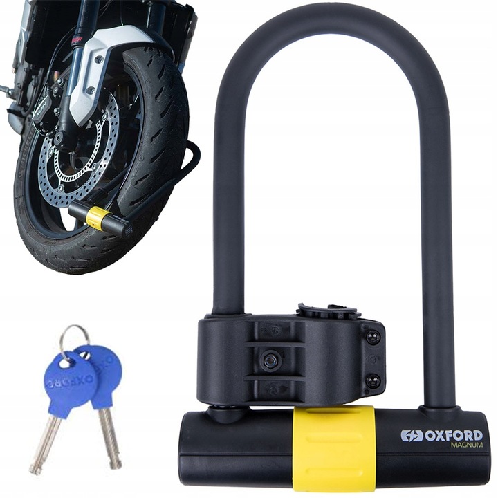 Black and yellow OXFORD LK223 motorcycle disc lock with a sturdy U-shape design, accompanied by two blue keys, securing a motorcycle wheel in the background.