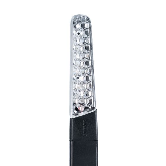 Clear LED indicator with a hexagonal lens design, featuring a black plastic base, designed for easy replacement on vehicles.
