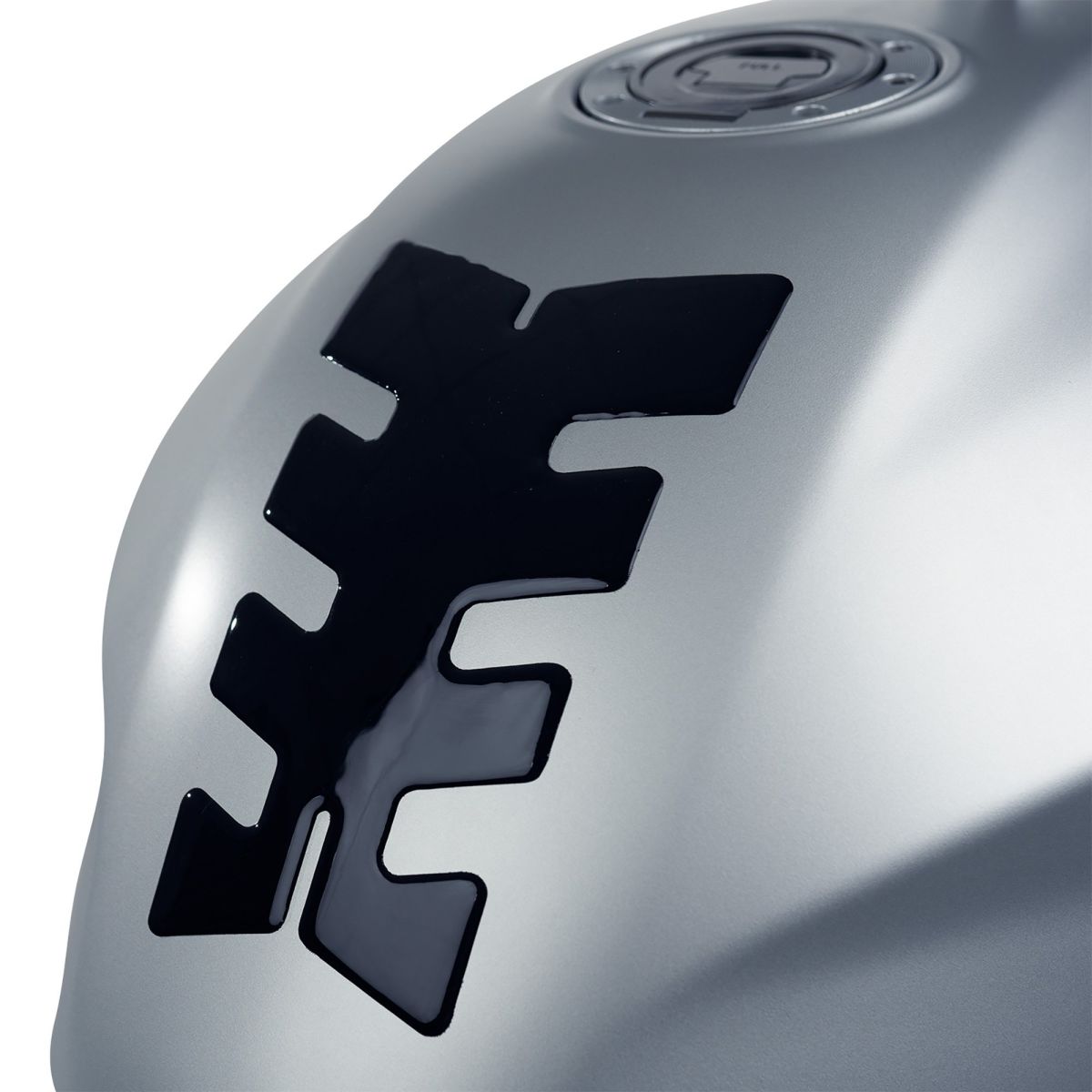 Silver tank protector featuring a glossy black 3D gel design with a stylized 'X' shape, designed to enhance grip and protect the tank surface.