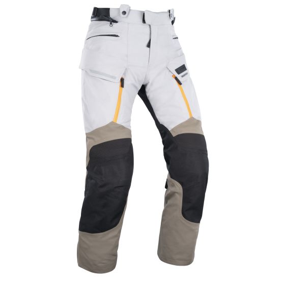 Waterproof textile pants in beige, white, black, and orange, featuring multiple pockets, reinforced knee areas, and a secure waistband, size M by Oxford.