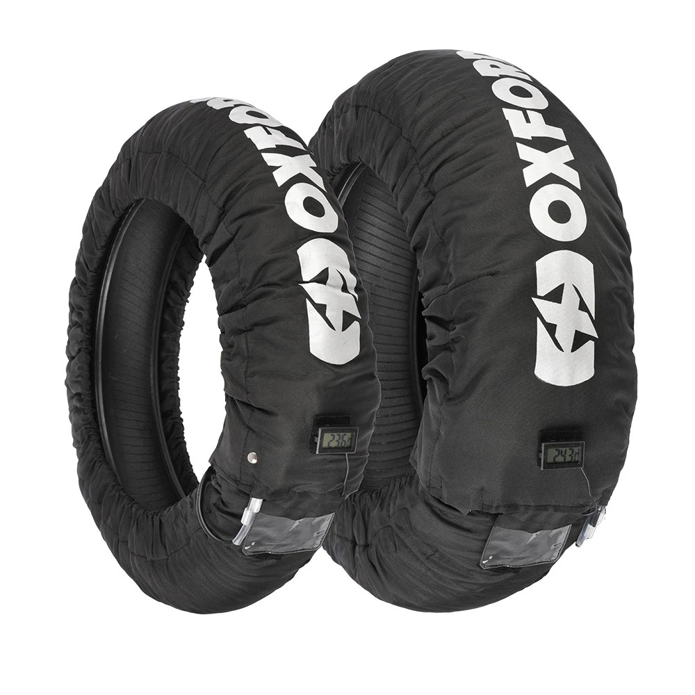 Black Oxford Tyre Warmers with white branding, featuring a durable outer material and an LCD display, designed for UK 3-pin plug use, sold as a pair.