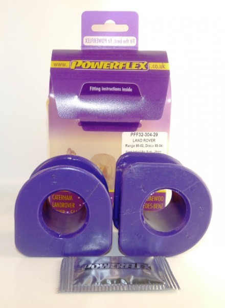 Purple polyurethane front anti roll bar bushes, designed for Land Rover models, packaged in a branded box with installation instructions and a small Powerflex sticker.