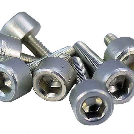 Silver aluminium fuel cap kit for Honda, featuring multiple hexagonal bolts with a polished finish and rounded heads, designed for durability and style.
